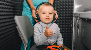 little boy during the hearing exam in the audiologist's office